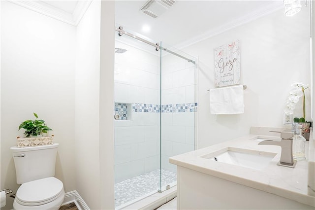 bathroom with vanity, toilet, walk in shower, and ornamental molding