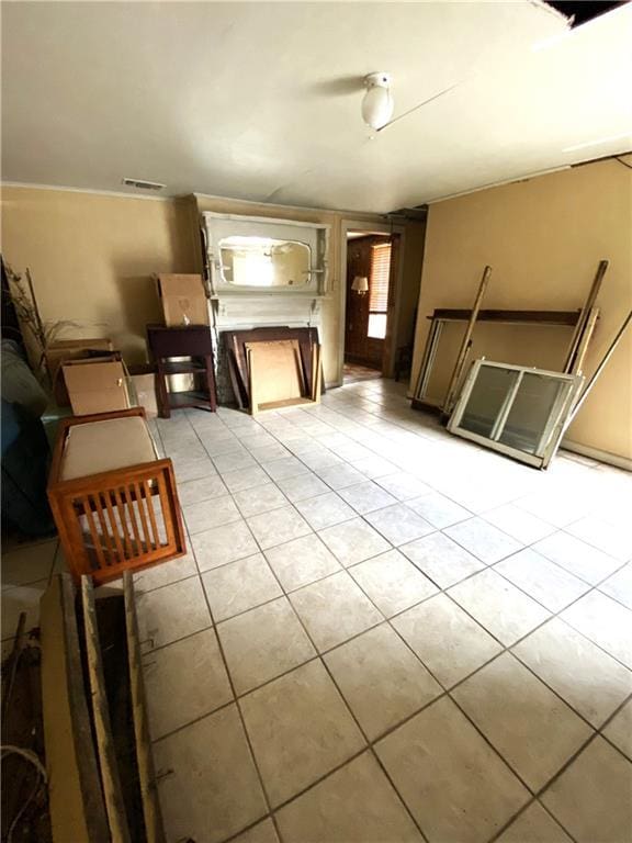 interior space featuring light tile patterned floors