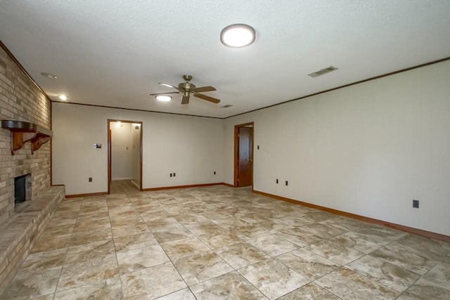 unfurnished living room with a brick fireplace and ceiling fan