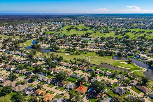 bird's eye view with a water view