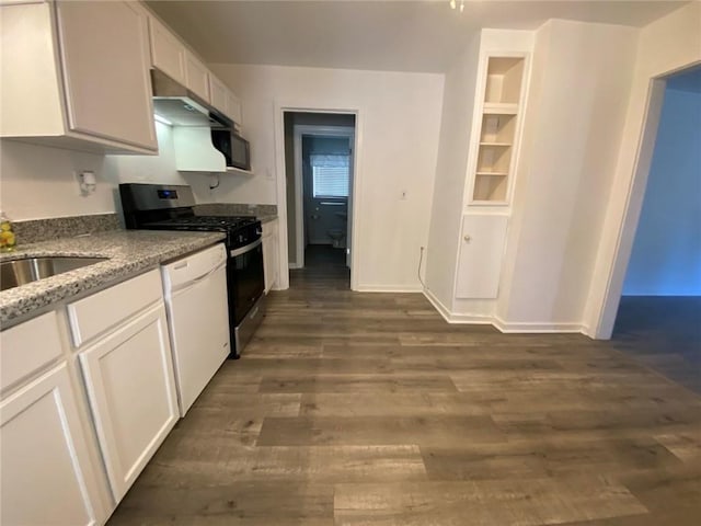 kitchen with light stone countertops, gas range, white dishwasher, dark wood-type flooring, and white cabinetry