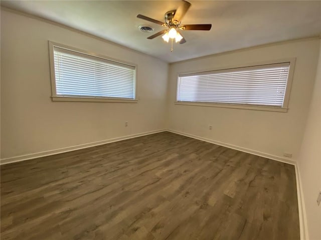 350 Carolyn Dr, Harahan, LA 70123 - empty room featuring ceiling fan, dark wood-style flooring, and ornamental molding