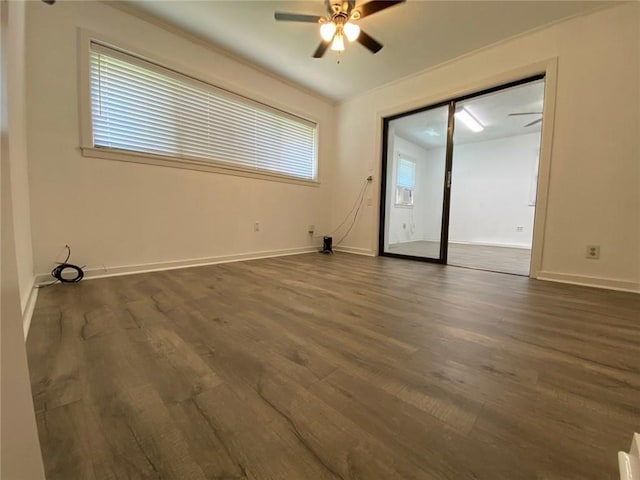 350 Carolyn Dr, Harahan, LA 70123 - empty room featuring a ceiling fan and dark wood finished floors