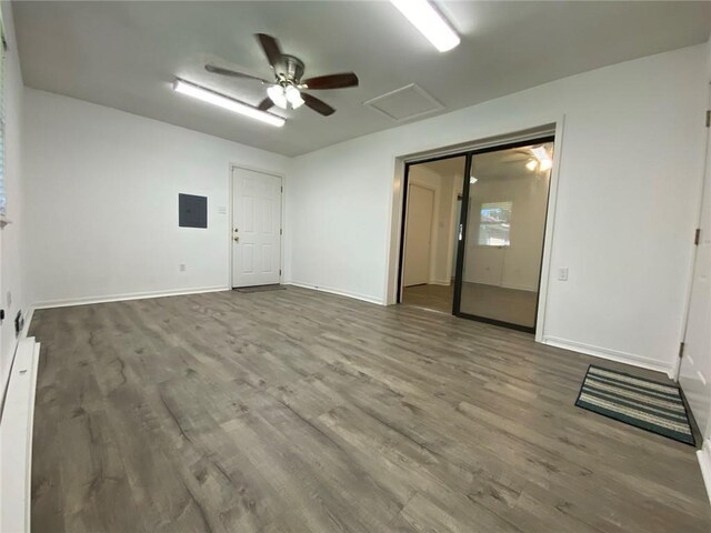 350 Carolyn Dr, Harahan, LA 70123 - empty room featuring attic access and wood finished floors