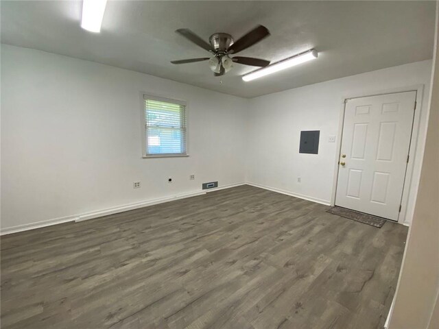 350 Carolyn Dr, Harahan, LA 70123 - spare room featuring ceiling fan, dark wood-style flooring, and electric panel