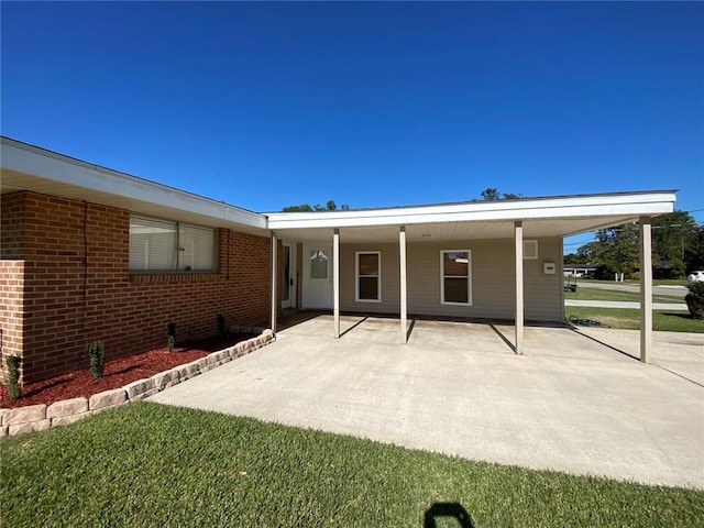 view of front of home with a carport