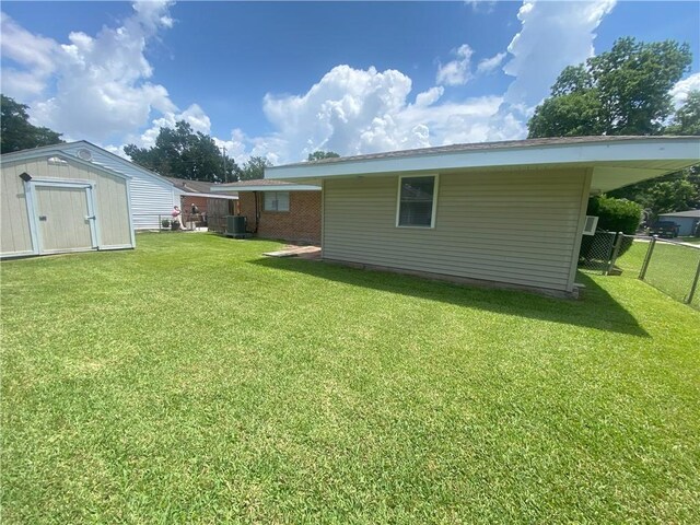 350 Carolyn Dr, Harahan, LA 70123 - view of yard featuring a storage unit