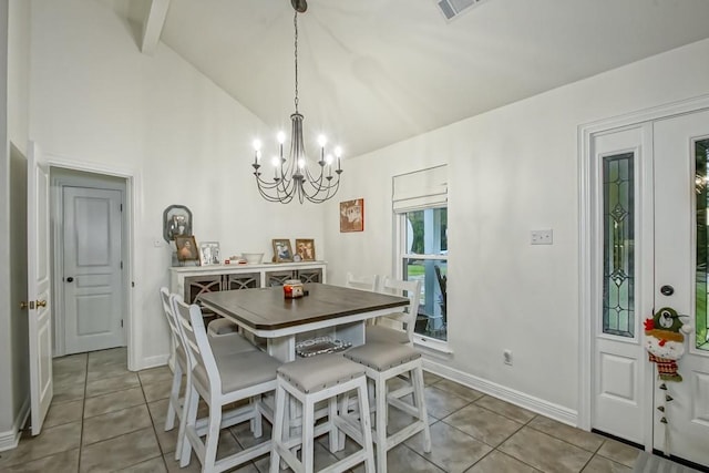 dining space featuring vaulted ceiling with beams, light tile patterned flooring, and a notable chandelier