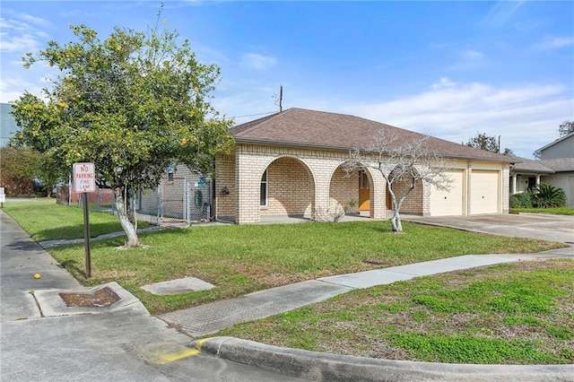 view of front facade featuring a porch, a garage, and a front lawn