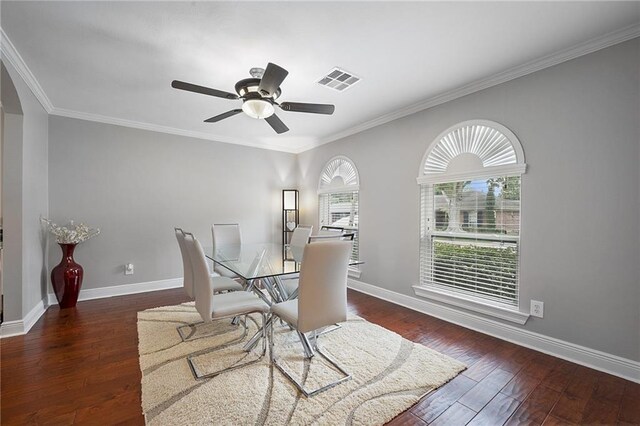 kitchen featuring stainless steel appliances, light tile patterned floors, backsplash, white cabinets, and ornamental molding