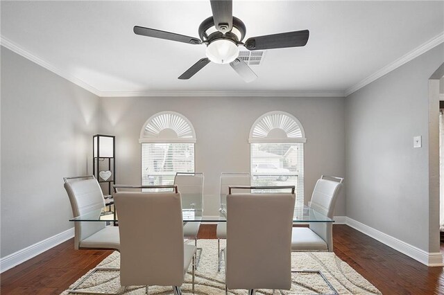 dining space featuring ceiling fan, dark hardwood / wood-style flooring, and ornamental molding