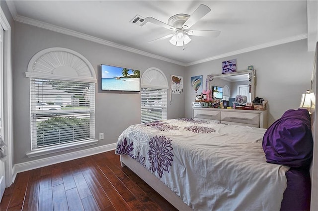 bedroom featuring dark hardwood / wood-style flooring, crown molding, and ceiling fan