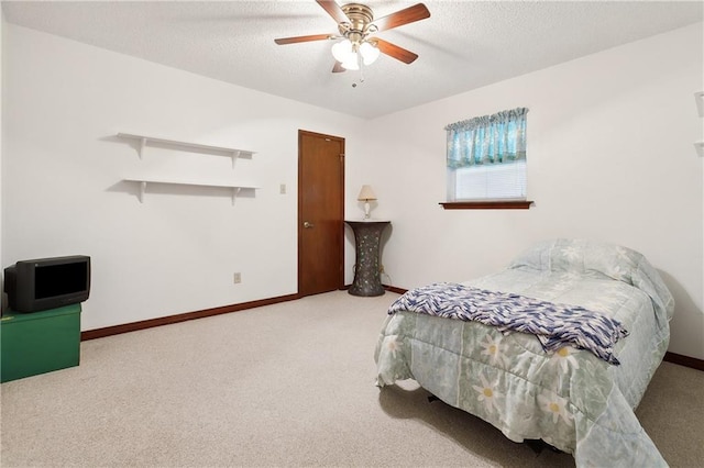 20 Cocodrie Ct, Kenner, LA 70065 - bedroom featuring carpet floors, baseboards, a ceiling fan, and a textured ceiling