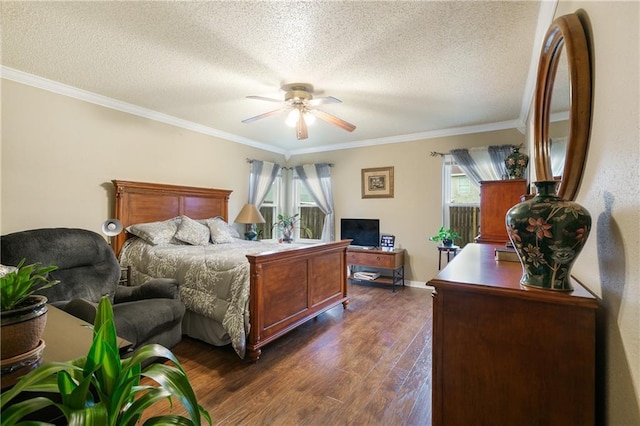 bedroom with ceiling fan, dark hardwood / wood-style flooring, a textured ceiling, and multiple windows