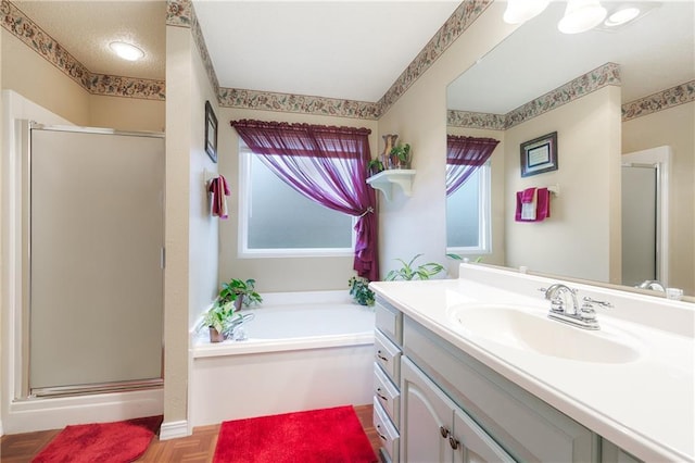 bathroom featuring vanity, separate shower and tub, and parquet floors