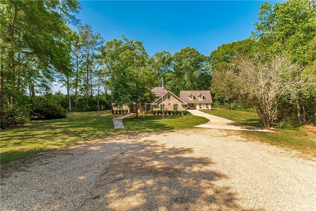 view of front of property with a front lawn