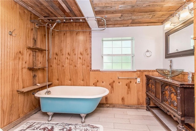 bathroom with vanity, hardwood / wood-style floors, wooden walls, and wooden ceiling