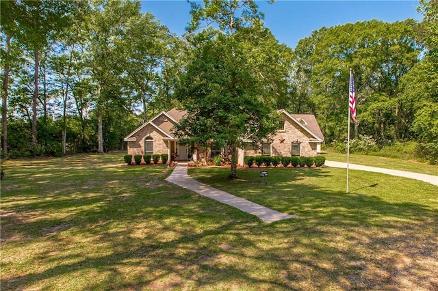 view of front of home with a front yard