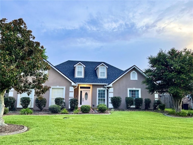 view of front of property with a front lawn