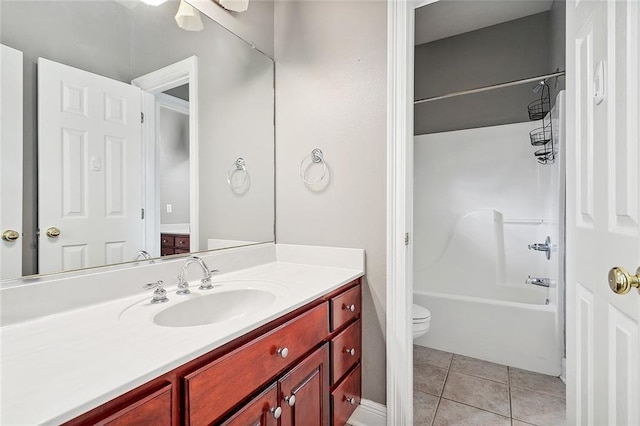 full bathroom with tile patterned floors, vanity, ceiling fan, shower / bathing tub combination, and toilet