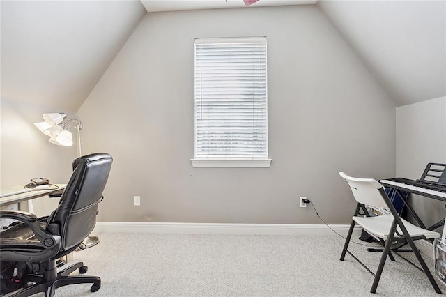 office space with carpet flooring and lofted ceiling