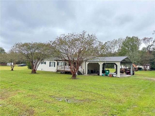 view of yard featuring a carport