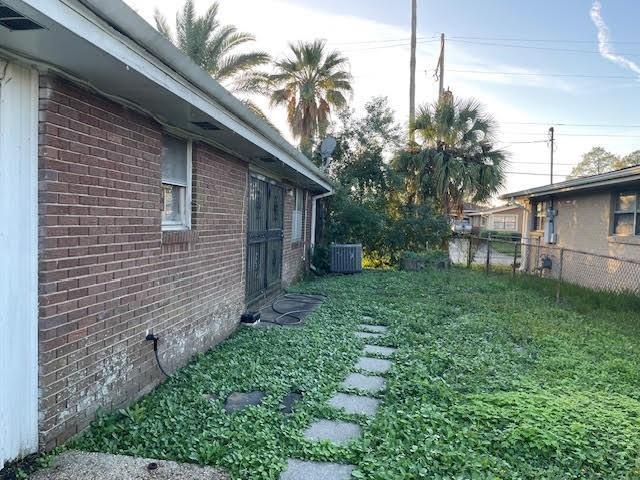 view of yard featuring central AC