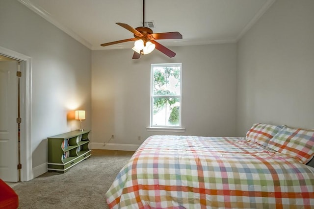 bedroom featuring ornamental molding, light colored carpet, and ceiling fan