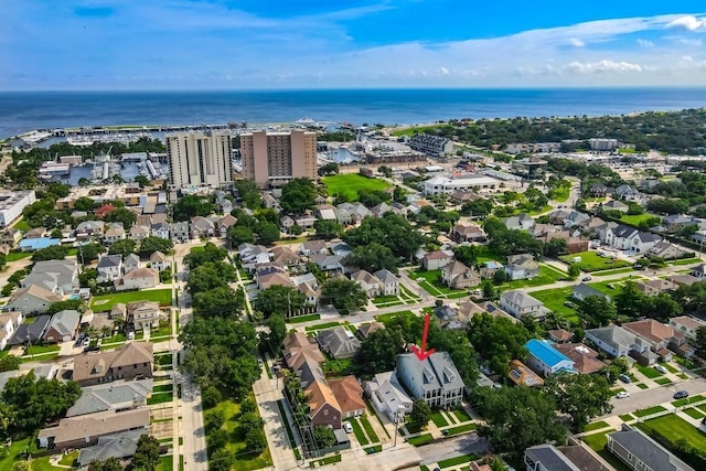 birds eye view of property featuring a water view