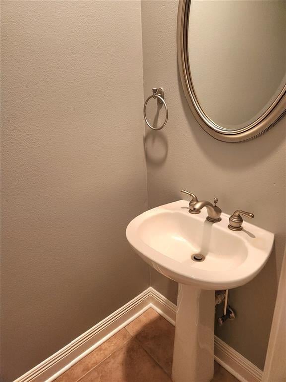 bathroom with tile patterned flooring