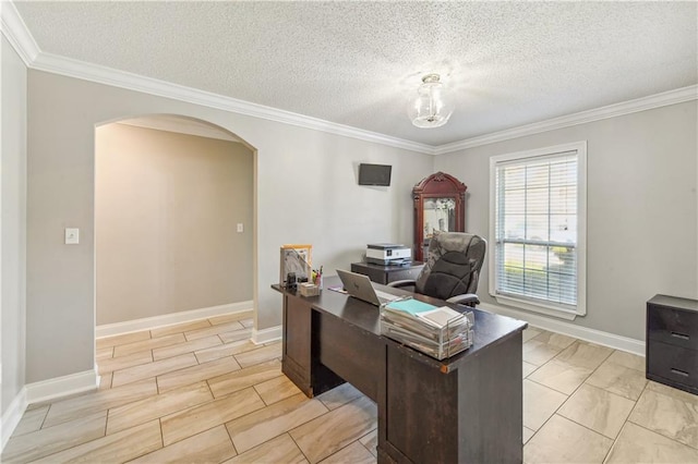 home office featuring crown molding and a textured ceiling