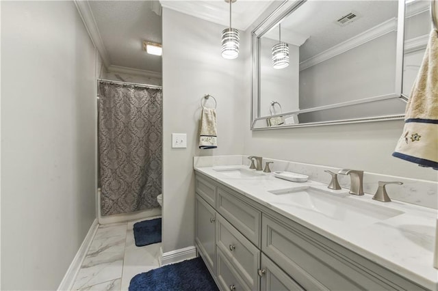 bathroom with a shower with curtain, vanity, toilet, and ornamental molding