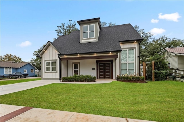 view of front of home with a front lawn