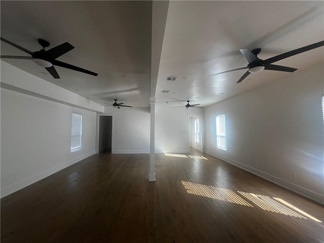 spare room featuring dark hardwood / wood-style floors