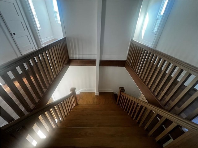 stairway with wood-type flooring