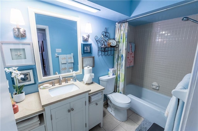 full bathroom with tile patterned flooring, vanity, shower / bath combo, and toilet