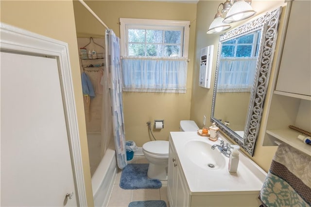 full bathroom featuring tile patterned floors, vanity, toilet, and shower / tub combo