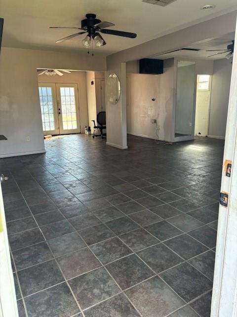 spare room featuring french doors