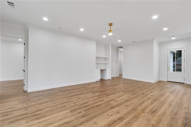 unfurnished living room featuring ceiling fan, light hardwood / wood-style floors, built in desk, and ornamental molding