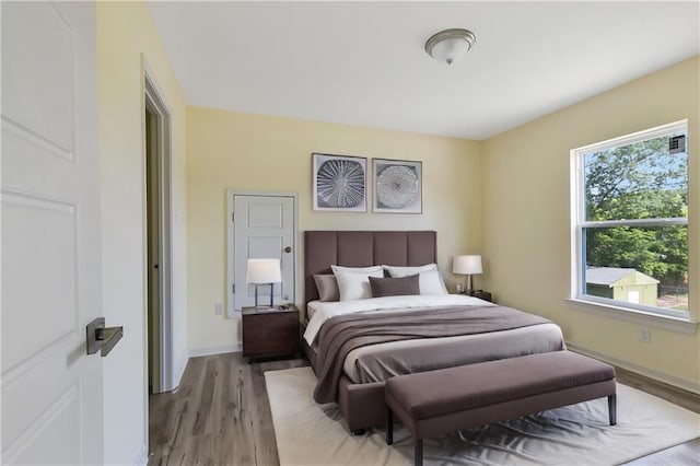 bedroom featuring hardwood / wood-style flooring