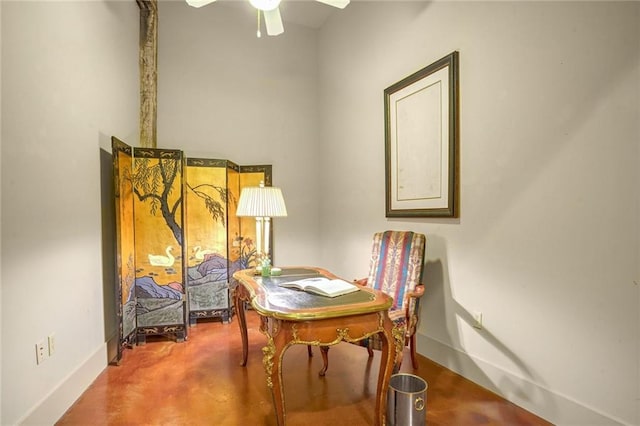 sitting room featuring ceiling fan