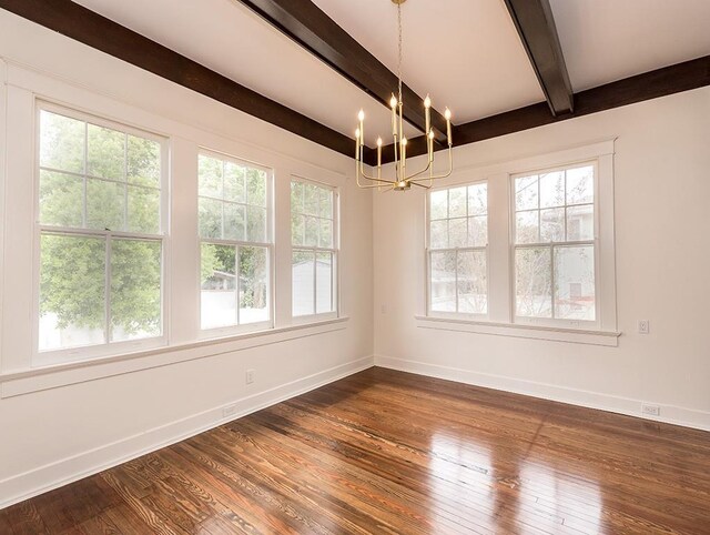 unfurnished dining area featuring wood-type flooring, beam ceiling, and an inviting chandelier