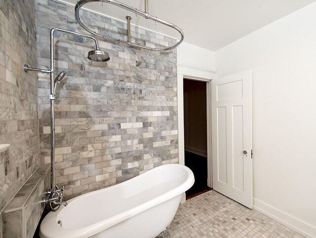 bathroom with a tub