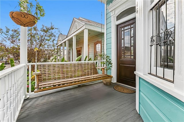 wooden deck featuring covered porch