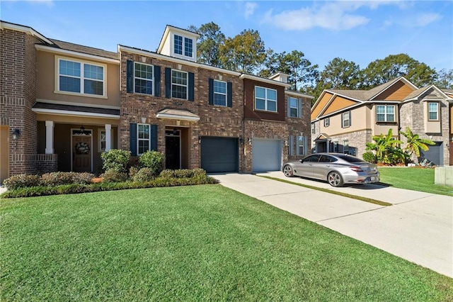 view of property with a front lawn and a garage