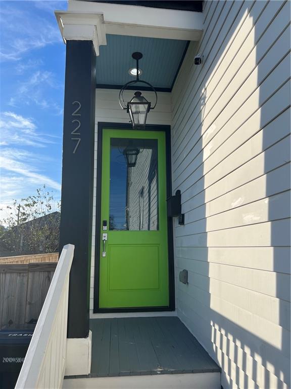 doorway to property with cooling unit