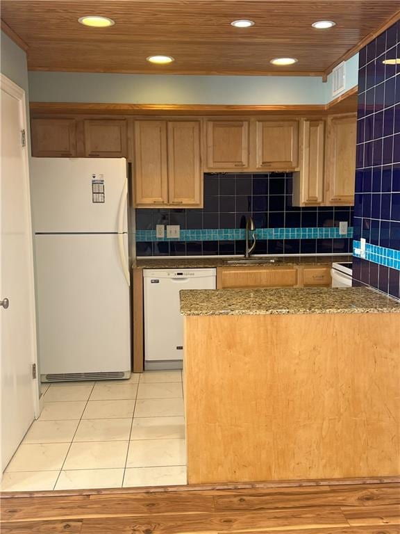 kitchen with white appliances, sink, decorative backsplash, light tile patterned flooring, and wood ceiling