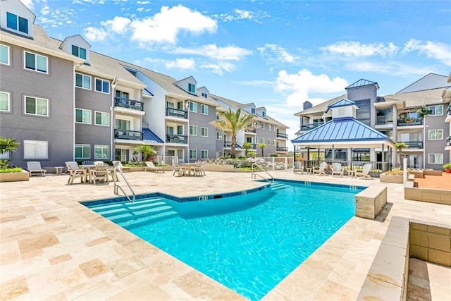 view of pool with a gazebo and a patio