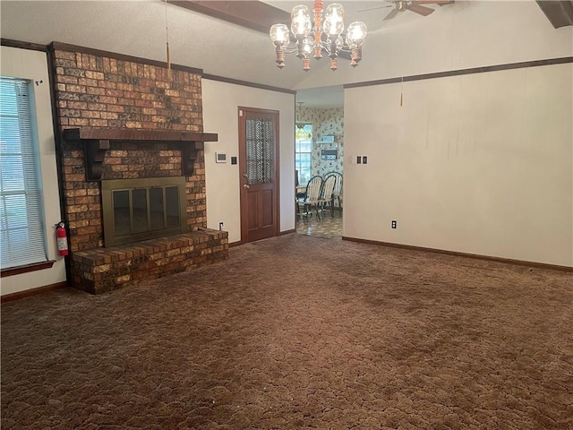 unfurnished living room with a brick fireplace, ceiling fan, crown molding, carpet floors, and lofted ceiling