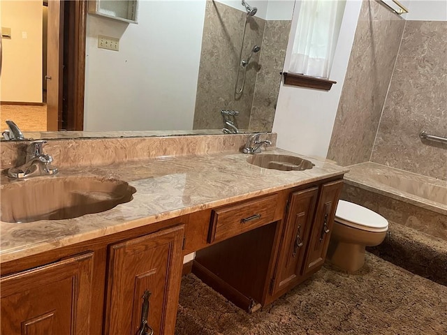 full bathroom with vanity, toilet, and tiled shower / bath combo